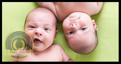 Infant twins lying in opposite direction with a lime green background. A Flourishing Life Society article on predictors of later problems with addiction. 