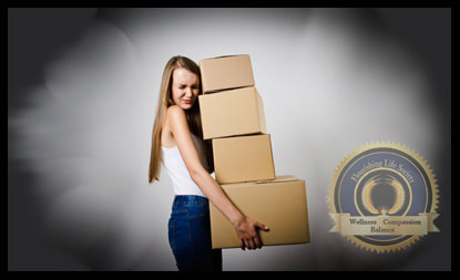 A lady carrying several heavy boxes, representing the impact of accumulating stress