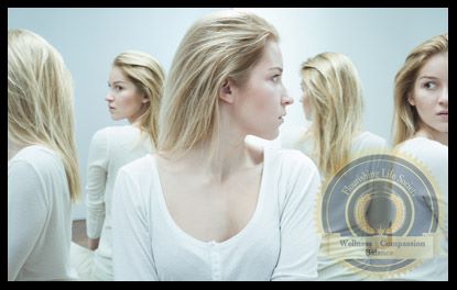 A young lady with four reflective images, representing multiple personality disorder. An article on dissociative disorders.