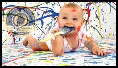 A baby against a background of splattered colorful paints. An article on Emotional Life.