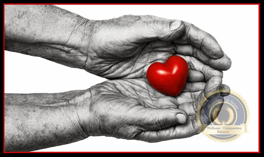 A older person's hands holding a plastic heart. A Flourishing Life Society article on Emotional connection