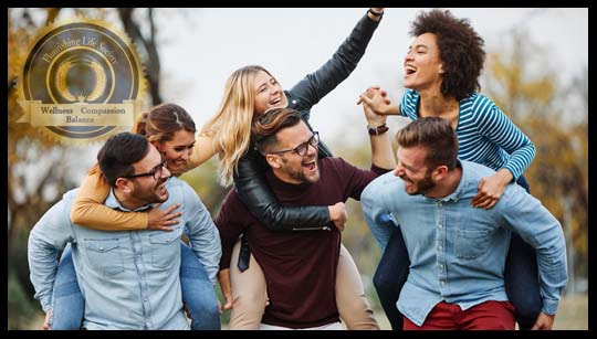 A Group of six friends having fun outside. A Flourishing Life Society article on the importance of human relationships