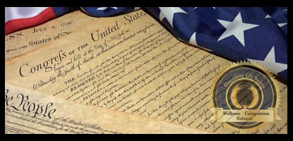 A picture of the Constitution and Declaration of Independence next tot he American flag. A Flourishing Life Society article on the need for freedom of press.