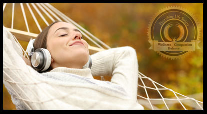 A woman relaxing in a hammock, with a happy expression on her face. An article on enjoying the present moment.