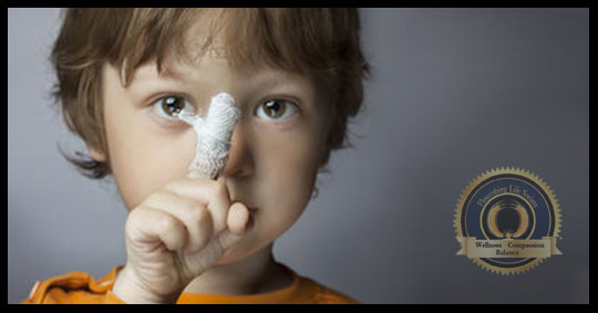 A little boy with a bandaged finger. A Flourishing Life Society article on the pains of life