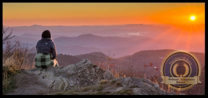 A lady mindfully watching a sunset. A Flourishing Life Society article on mindfulness and addiction recovery