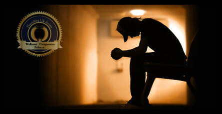 A silhouette of a man sitting alone. An article on addiction at Flourishing Life Society 