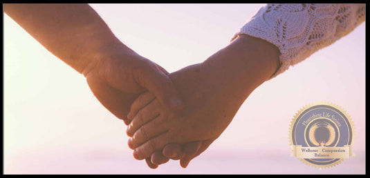 Couple holding hands. A Flourishing Life Society Article on Relationship Anxiety