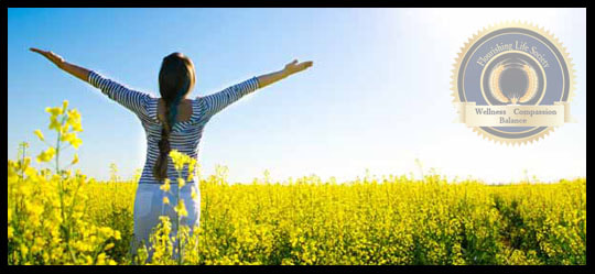 A woman standing in a field of flowers with arms out stretched to the sun. An article on soul care.
