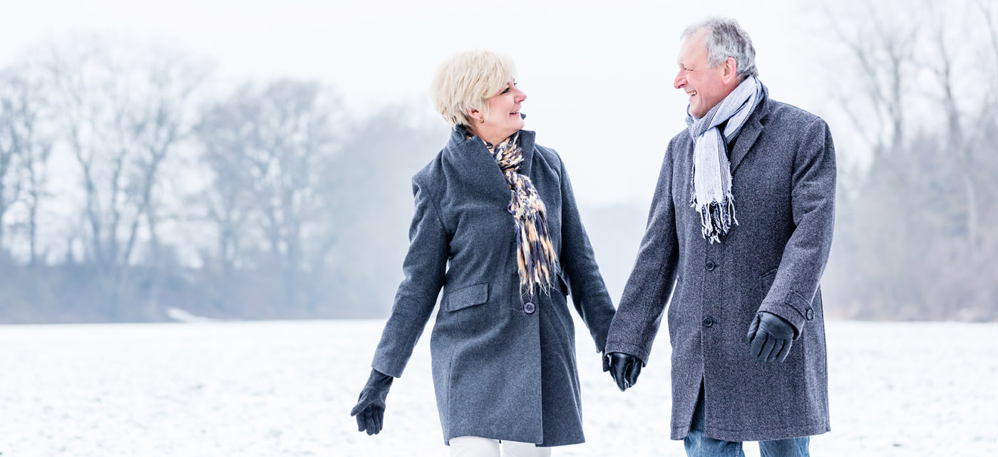 Mature couple holding hands. A Flourishing Life Society Article on relationships.