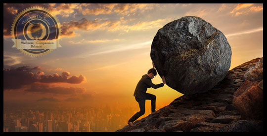 Change is Difficult. A man pushing a large boulder up a hill. 